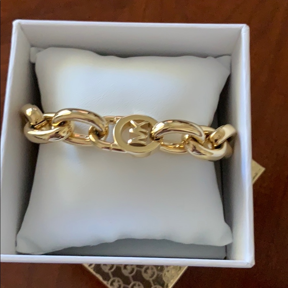 New never worn......Michael Kors gold bracelet